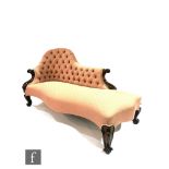 A Victorian mahogany framed chaise longue, buttoned spoon single back, on cabriole legs, upholstered