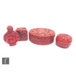 A collection of Chinese cinnabar lacquer items, to include a circular lidded pot carved with