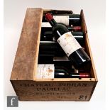 A case of twelve 75cl bottles of 1981 Château Pibran Pauillac, Bordeux, France, in original wooden