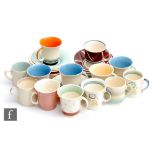 A collection of assorted 1930s and later Susie Cooper coffee cans and saucers to include Tango,