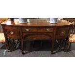 A George IV satinwood cross-banded mahogany buffet sideboard with line inlaid detail and brass