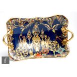 A Carlton Ware Art Deco rectangular footed twin handled dish decorated in the Fantasia pattern,