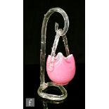 A late 19th Century small posy basket decorated in pink over opal with applied clear loop handle,