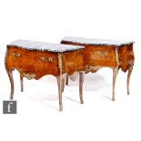 A pair of late 20th Century walnut veneered and parquetry inlaid bombe fronted commode chests in the