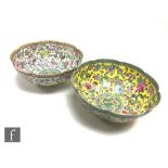 Two Chinese eggshell porcelain bowls, each of scalloped lotus form, each similarly decorated with