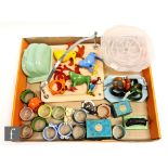 A collection of assorted early plastics and Bakelite to include two boxed sets of Birmite napkin