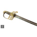 A 19th Century officer's sabre with pierced brass hilt and hinged guard, rayskin grip, the