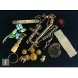 A small parcel lot of items to include 9ct dress studs and charms, total weight 3g, silver brooches,