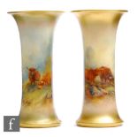 A matched pair of early 20th Century Royal Worcester shape G923 trumpet vases panel decorated by
