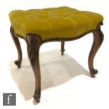 A Victorian walnut dressing table stool on shaped cabriole legs, upholstered in gold buttoned plush,