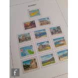 A collection of Queen Elizabeth II Guernsey and Alderney commemorative postage stamps, Guernsey