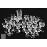 A collection of 19th Century and later clear crystal drinking glasses to include acid etched,