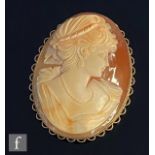 A modern 9ct hallmarked mounted oval cameo brooch head and shoulder profile of a classical maiden,