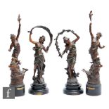 Two pairs of late 19th Century spelter figures of dancing maidens and two with deer, height 50cm. (