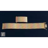 A 9ct hallmarked three coloured panelled bracelet total weight 26g, length 19cm, terminating in