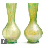 A pair of late 19th to early 20th Century Kralik glass vases of footed globe and shaft form in the