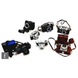 A collection of Russian and German SLR and medium format cameras, to include Zenit 11  (lacking