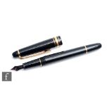 A Mont Blanc Meisterstuck fountain pen, with 15ct nib, length 14cm.