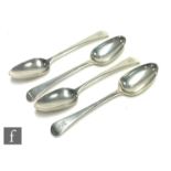 A set of four George III hallmarked silver old English pattern table spoons, total weight 9.5oz,