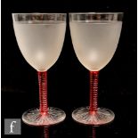 A pair of late 19th Century Stourbridge crystal wine glasses, possibly Richardsons, the ovoid bowl