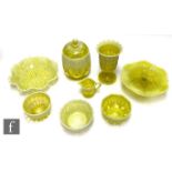 A collection of 19th Century Davidsons pressed Primrose Pearline glass to include a biscuit