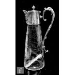 A late 19th Century clear crystal claret jug by Percival Vickers of tapered cylindrical form cut and