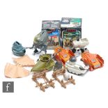 A collection of Kenner Star Wars mini-rigs and other items, to include two Ewok Assault Catapults,