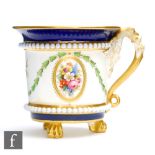 An early 20th Century Royal Worcester tri-footed mug shape 2115, decorated with hand painted