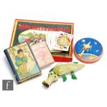 An early 20th Century Monkeys & Bridges board game with two monkey playing pieces, together with a