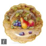A Royal Worcester Fallen Fruits cabinet plate decorated by Lockyer with hand painted pears and red