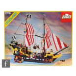 A Lego 6285 Black Seas Barracuda pirate ship, boxed and appears complete (not checked).