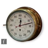 A 20th Century brass bulk head clock by Smiths Astral, no AP160174, width 26cm.