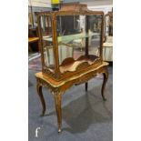 A late 19th to early 20th Century Louis XIV style kingwood display cabinet/vitrine,