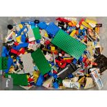 A collection of assorted Lego pieces to include various brick and minifigures, along with