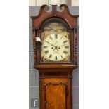 A 19th Century oak and mahogany longcase clock with eight day striking movement, painted arch dial