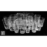 A collection of 19th Century and later clear crystal glasses and tumblers with acid etched and