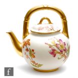 A Royal Worcester blush ivory tea kettle decorated with sprays of flowers against the pale ground,
