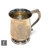 A hallmarked silver half pint tankard of baluster form engraved initials to front, weight 6.5oz,