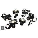 A collection of Pentax cameras, to include MZ-30 with a SMC Pentax - FA 1:3.5-5.6 28-80mm lens,