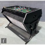 A Strikeworth Trisport multi-games table, the compact rotating table with pool table, air hockey and