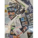 A collection of British stamps in albums and loose to include 1970s gutter pairs with traffic