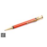 A Parker Duofold propelling pencil in orange case inscribed with the name Aage Jorgensen, a Danish