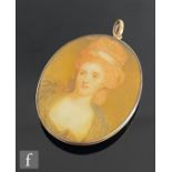 An 18th Century oval head and shoulder portrait miniature by engraved to reverse 'Portrait of