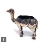 An Edwardian hallmarked silver pin cushion modelled as a standing camel, height 5cm, length 6cm,