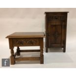 A 17th Century style carved oak bedside cupboard fitted with a drawer, width 40cm, and a similar