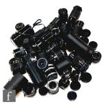 A large collection of camera lenses, various formats and ranges, makers include Chinon, Praktica,