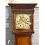 Amended description - An 18th Century eight day clock movement with twelve inch brass dial,