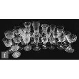 A collection of 19th Century and later clear crystal drinking glasses to include cut, engraved and