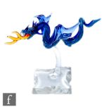 Milon Townsend - A contemporary lampworked glass figure of a fire breathing dragon in flight,