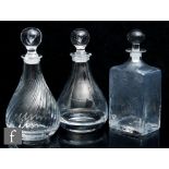 Dartington - Three later 20th Century glass decanters, the first a Directors decanter of tapered